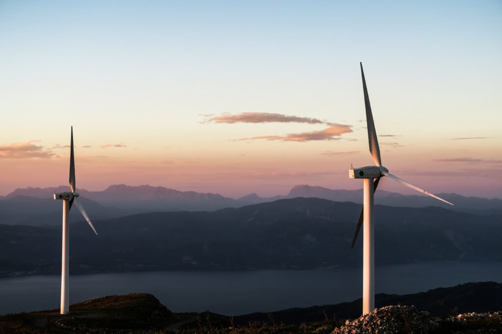 Wind turbines with mountains in background