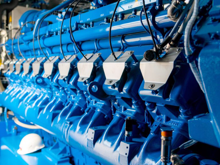 Engine of CHP unit. Diesel and gas industrial electric generator. Alternative energy for industry.