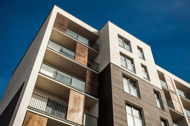 Residental Building on sky background representing property management