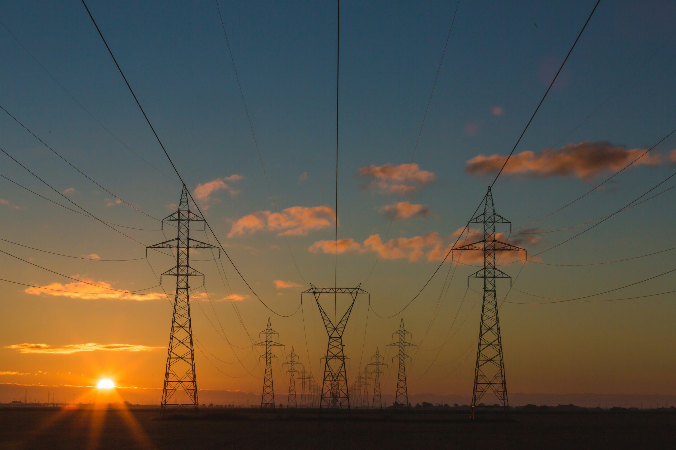 power lines at sunset representing MHHS